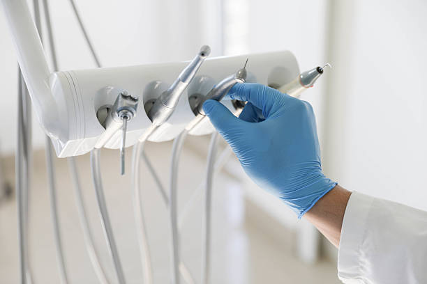 Professional Wisdom Tooth Removal technician working in Groves, TX